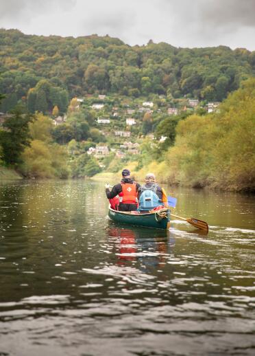 Canoeists on a river.
