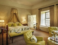 A luxurious looking bedroom in light colours