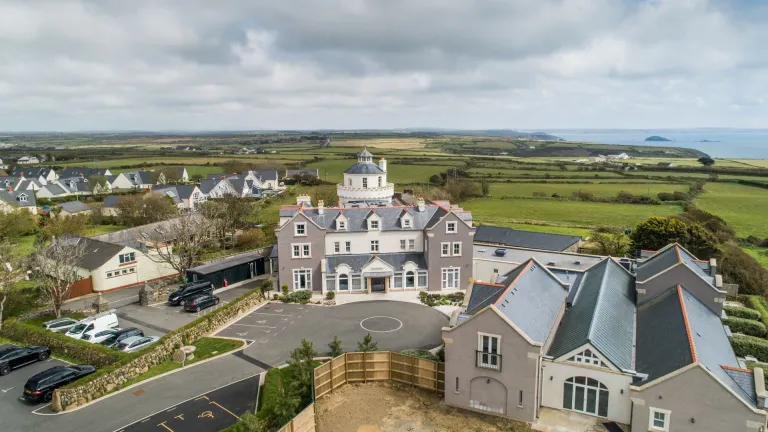 An aerial shot of Twr y Felin Hotel with the Pembrokeshire coast in the background.