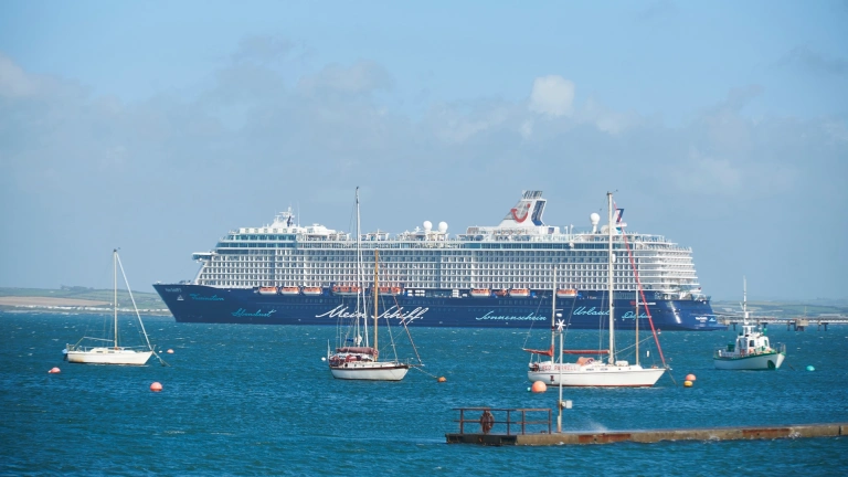 A cruise ship heading for port.