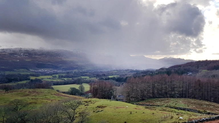 Views of the valley below from a high mountain.