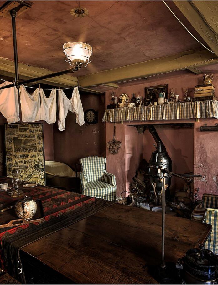 Bloomers drying in the servant's quarters and two armchairs by the fireplace at The Judge's Lodging.