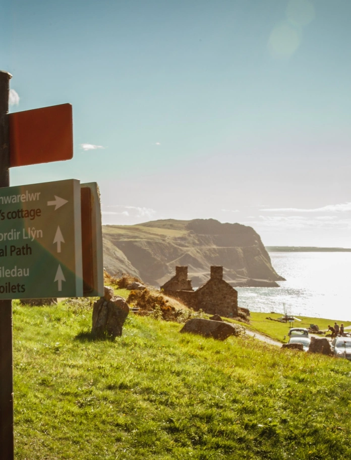 Views of the coast and a former quarryman's village.