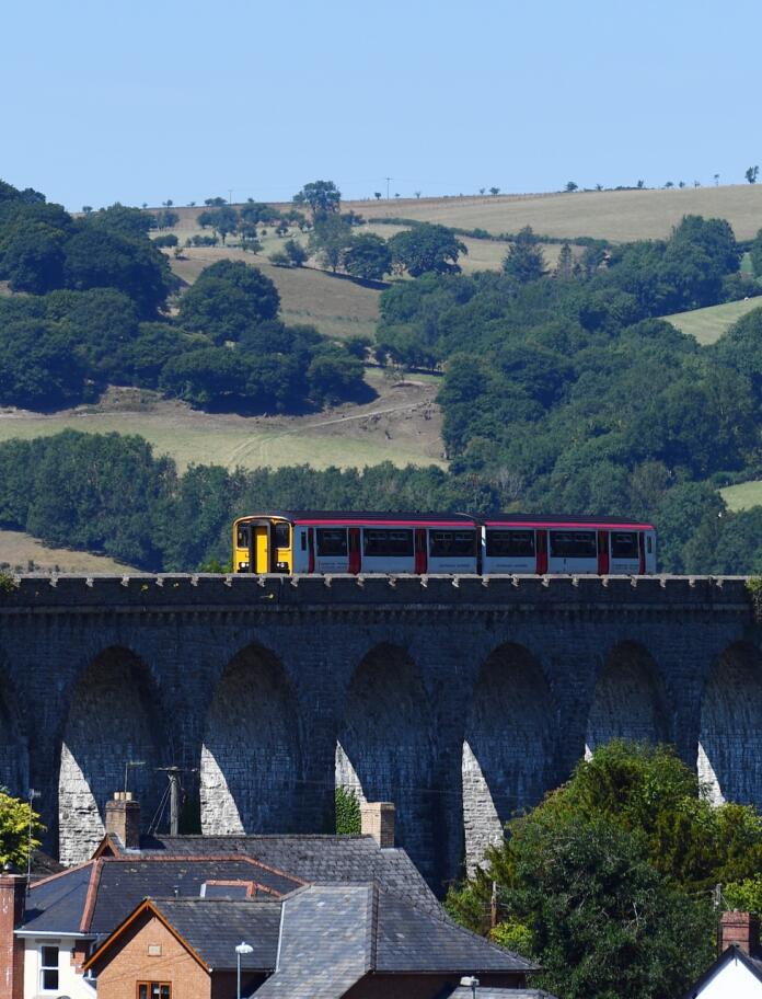 A train travelling over a viaduct.