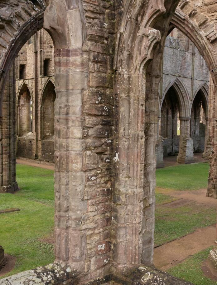 The pillars inside the ruins of an abbey.