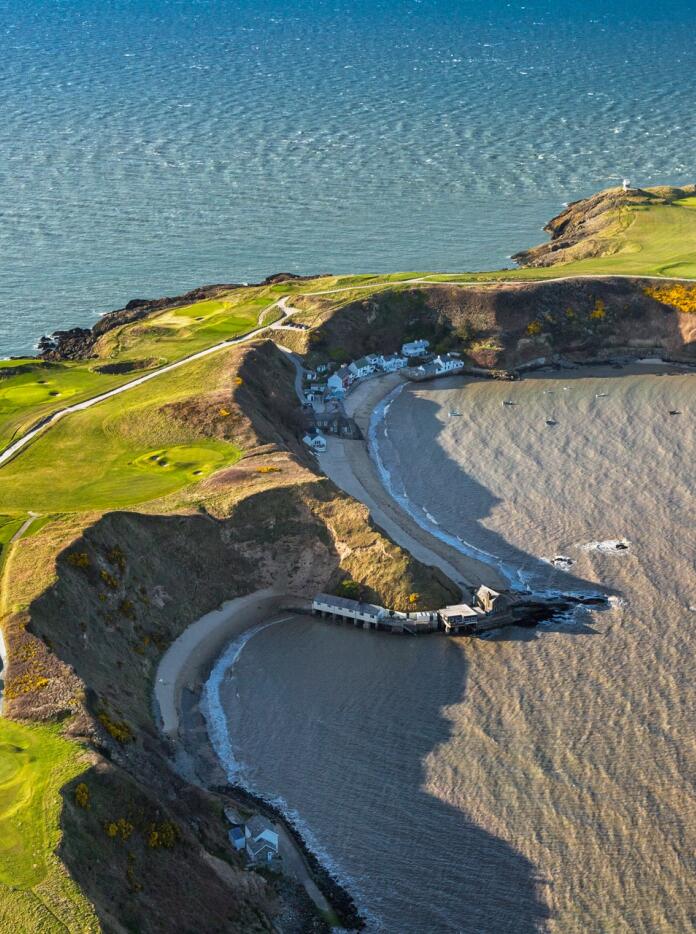 Aerial shot of a golf course and peninsula.
