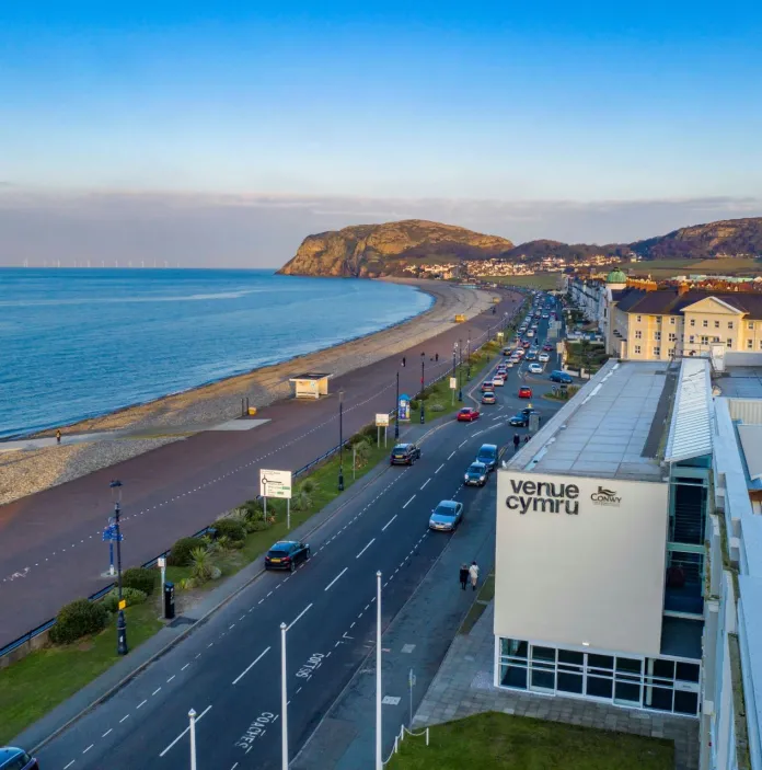 A theatre alongside the promenade with views of the coast.