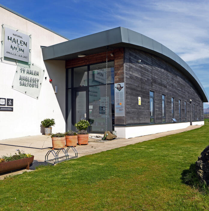 Image of the outside of the Halen Môn Saltcote Visitors Centre.