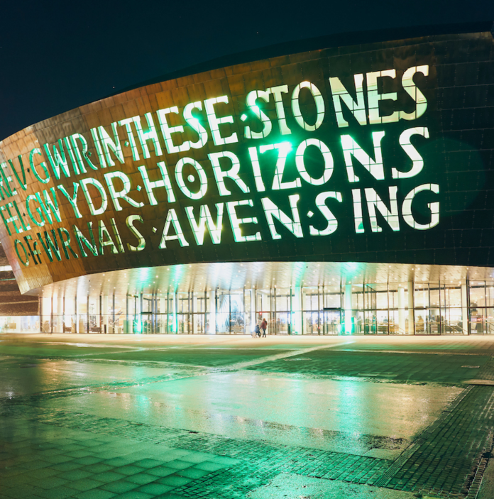 Exterior of Wales Millennium Centre at night.