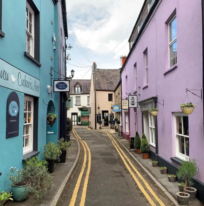Colourful shops and restaurants in a market town.