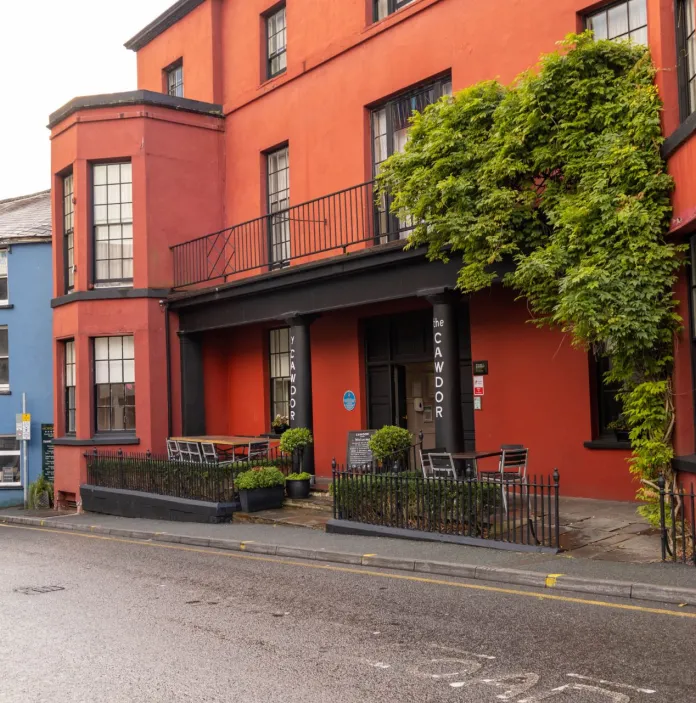 Colourful shops and restaurants in a market town.