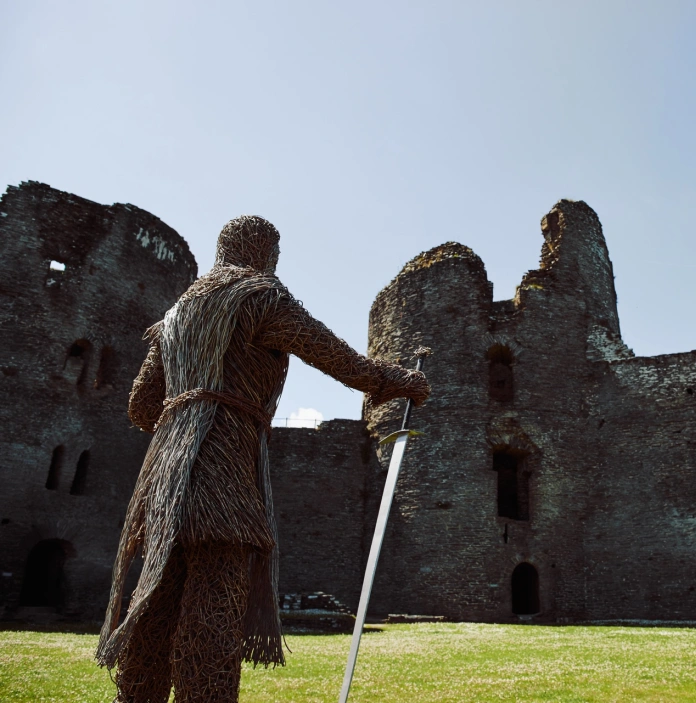 The outer walls and towers of a castle.
