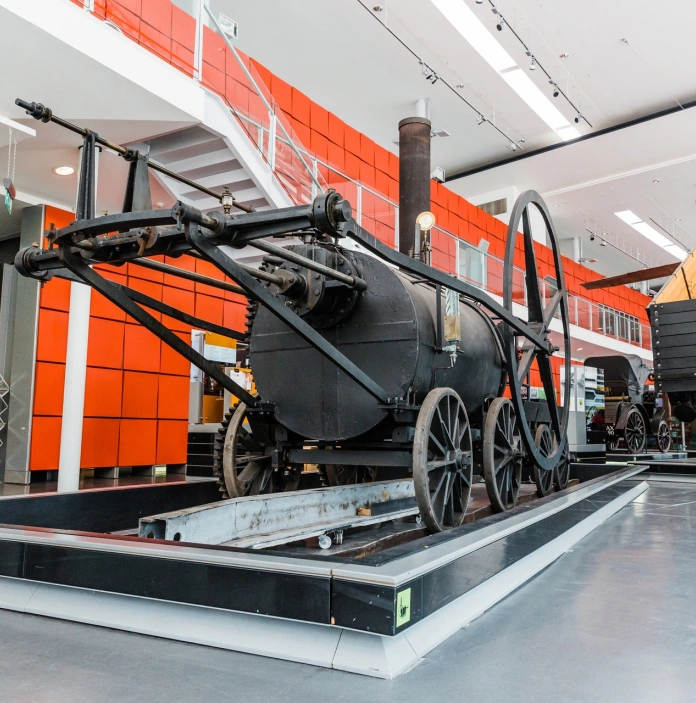 An industrial vehicle on display in a museum.