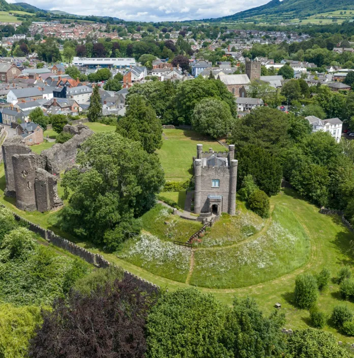 Aerial shot of a museum, castle and market town.