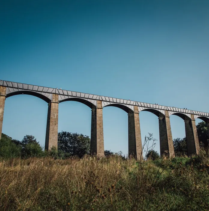 View of a tall aqueduct.