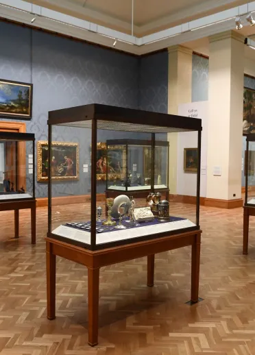 Displays of artefacts at National Museum Wales.