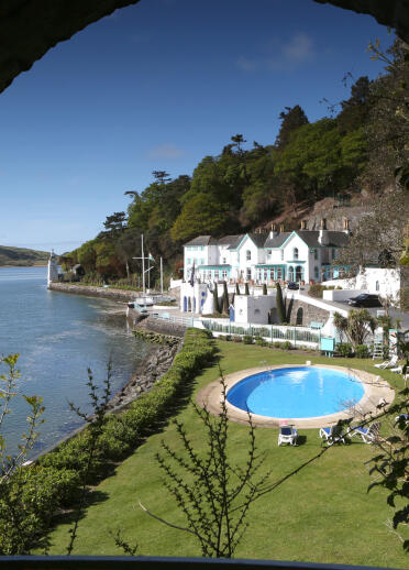 Hotel Portmeirion and the outdoor swimming pool on a sunny day.