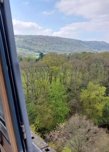 Views from a narrowboat across an aqueduct.