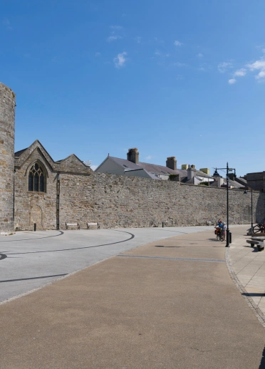 Castle and town walls along the quayside.