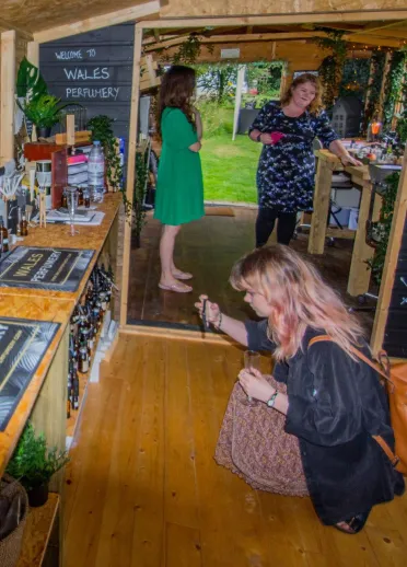 Group of people in a perfumery laboratory.