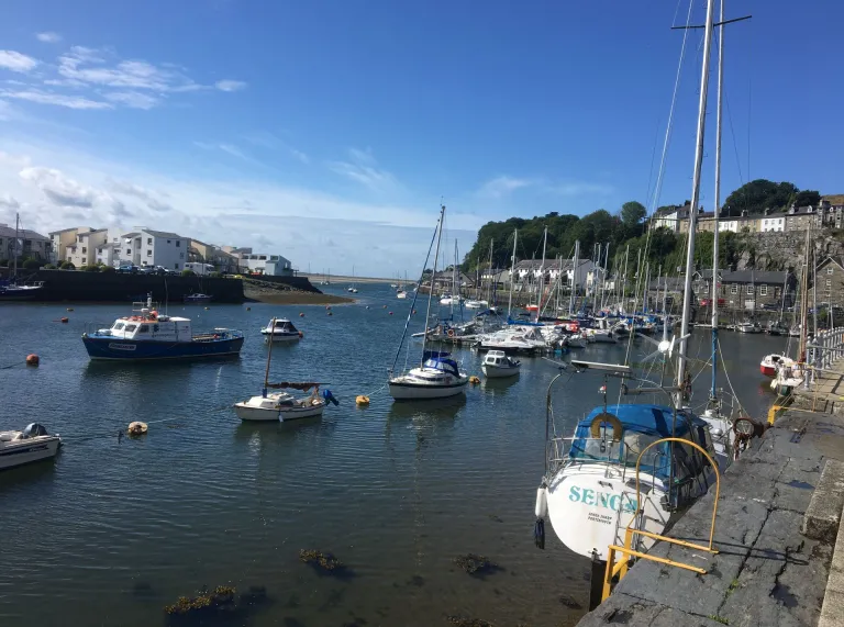 Boats in a harbour on a sunny day.