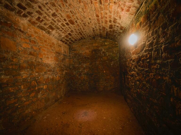 An underground room in a castle.