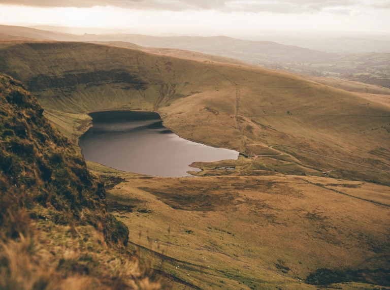 A large lake nestled around mountainous terrain.