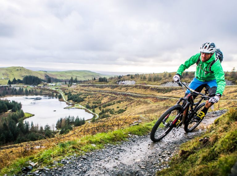 Mountain biker at Nant yr Arian bike park.
