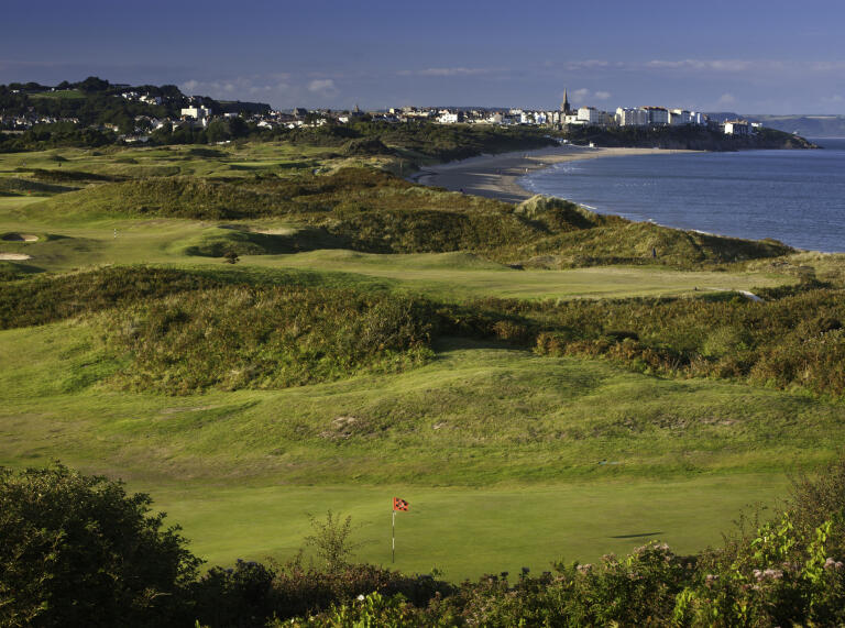 Tenby Golf Course with South Beach and town in background.