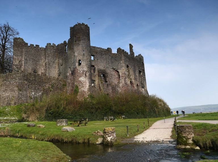 A semi-ruined castle by the coast.