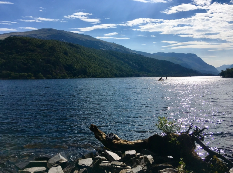 A lake surrounded by mountains.
