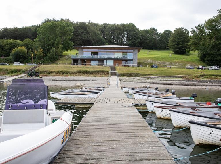A boating lake, jetty and a visitor centre.