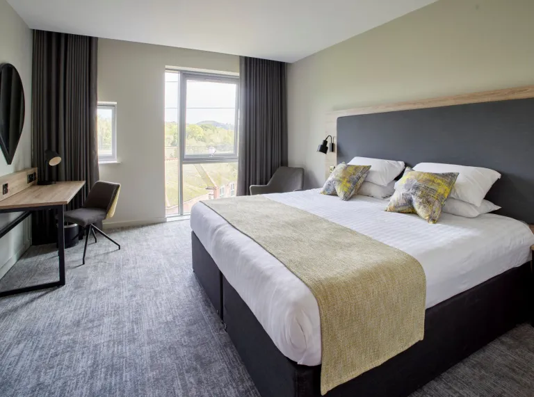 A bedroom in a hotel.