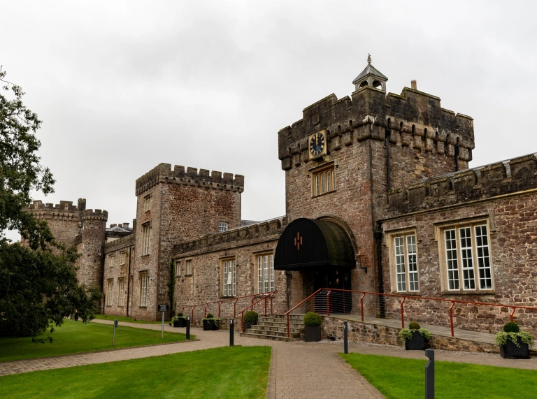 External shot of a distillery in a castle.