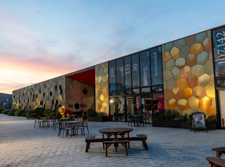 External shot of The Royal Mint at dusk..