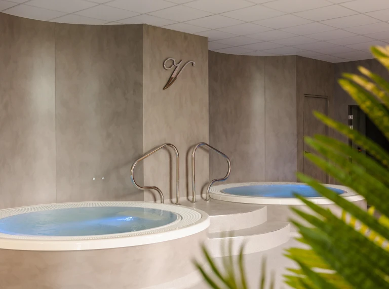 Jacuzzi pools at a health club.