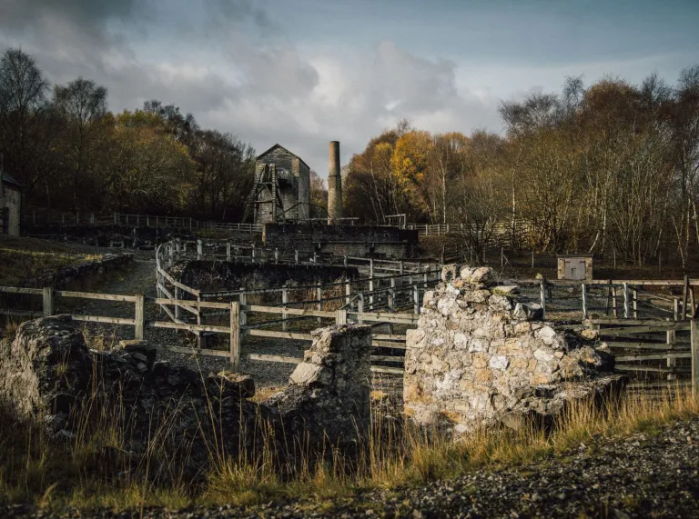 A winding wheel and chimney at the top of a path.
