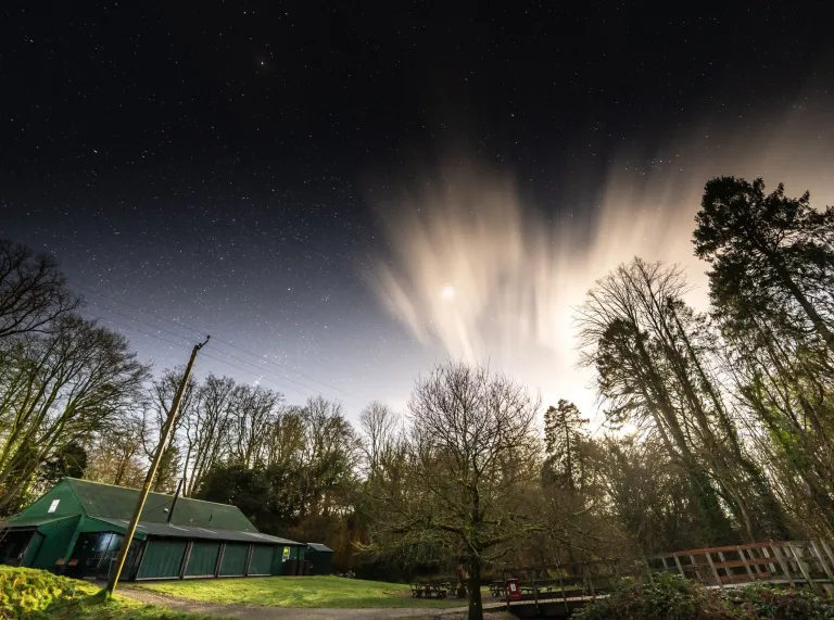 Nighfall above a visitor centre to an historic manor.