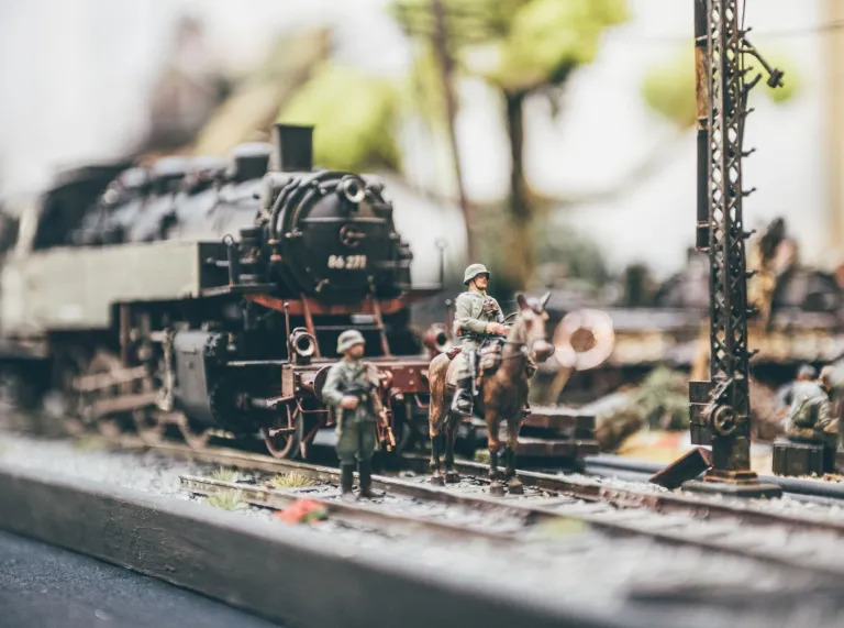 Close up of a steam train on a model railway in a museum.