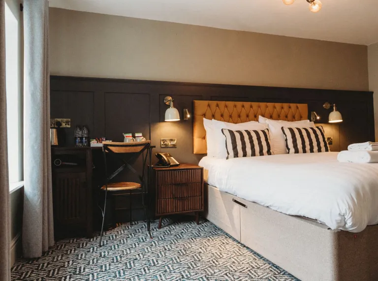 A bedroom in a hotel.