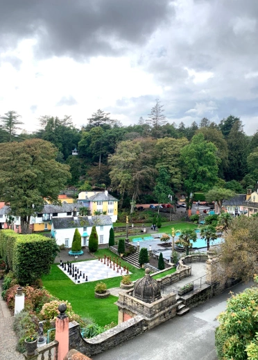 Italianate architecture in a magnificent garden with a giant chessboard and water feature.