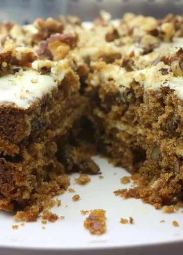 Coffee and walnut cake on a plate.