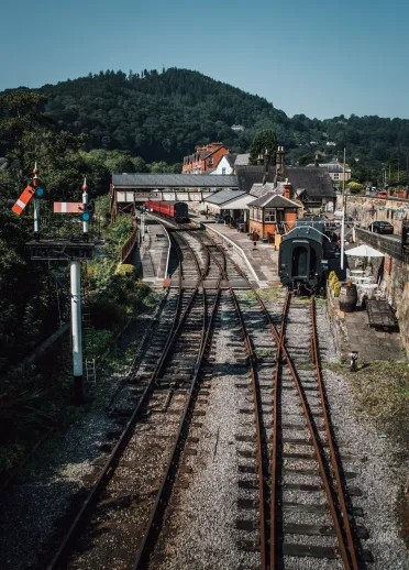 A steam train at a station.