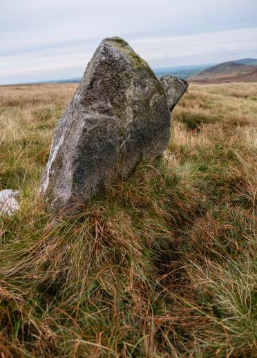 Two of the thirteen upright stones of Bedd Arthur or Arthur's Grave on the Preseli hills.