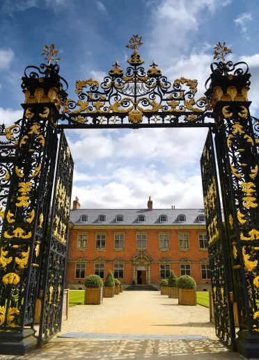 The magnicent gates opening to Tredegar House.