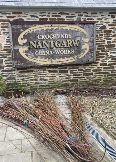 Frontage and sign of a china works.