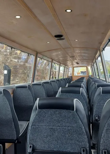 Inside seats on a narrow boat.