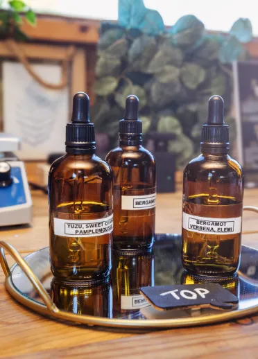 Bottles of perfume in a perfume-making workshop.