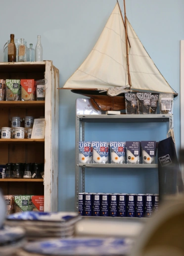 Shelves in a shop filled with pure sea salt products.