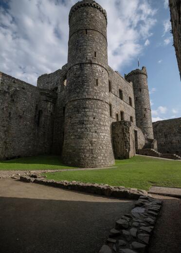 Outside shot of Harlech Castle with a view of the towers and entrance.